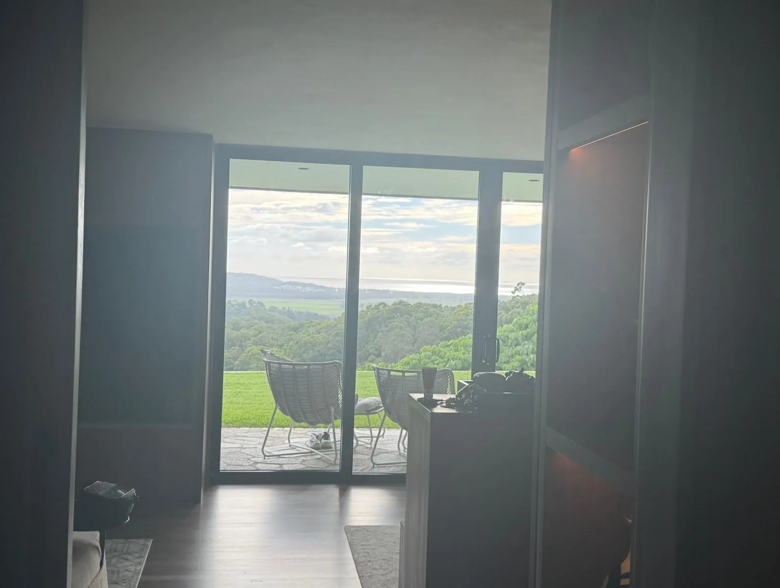 Living room glazing framing views across the valley